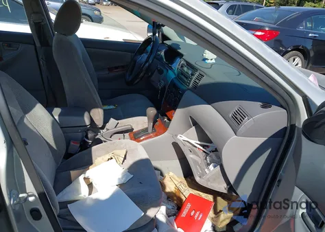 2003 Toyota Corolla Le z USA, uszkodzony, nr VIN 2T1BR32E13C136169